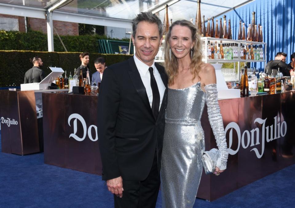 The “Will and Grace” star (left), dressed for the event in an elegant, yet simple, tux, smiled broadly as he and Janet Leigh Holden, dressed in a silver dress with matching evening gloves, posed for photos and were even spotted holding hands. Vivien Killilea/Getty Images for Tequila Don Julio
