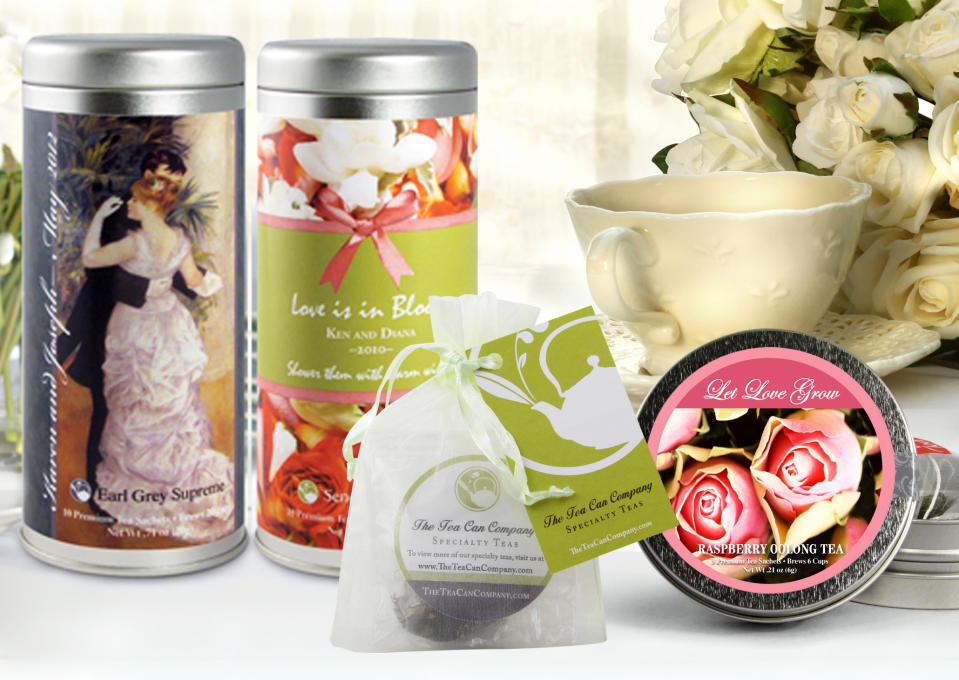 This Nov. 14, 2013 photo provided by The Tea Can Company shows Wedding Tea Specials, a range of personalized products offered by The Tea Can Company, from left, Tall Tins, Organza bags and Mini Tins, for weddings and bridal showers. The wedding favor, that little thank-you-for-coming gift, has risen to new heights with the bride and groom giving guests a wide range of favors that are meaningful to them. (AP Photo/The Tea Can Company)