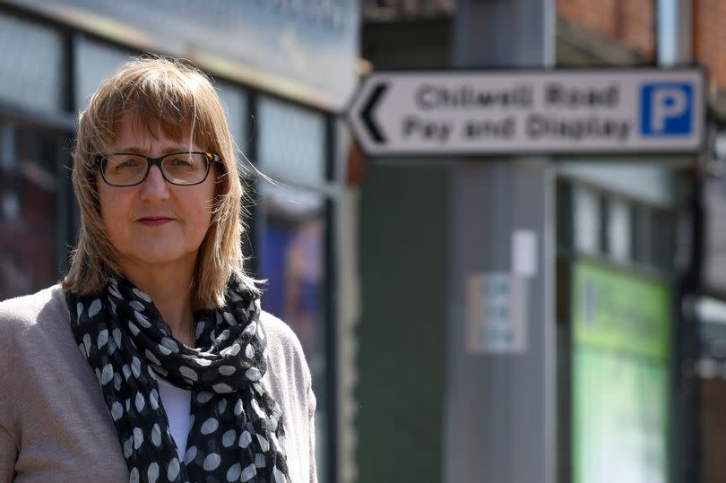 Philippa Dytham-Double, owner of Double Image Photography pictured outside her studio in Chilwell Road with her hands in her pockets wearing a light brown jumper