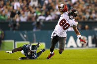 Tampa Bay Buccaneers tight end O.J. Howard (80) is stopped by Philadelphia Eagles outside linebacker Genard Avery (58) during the second half of an NFL football game Thursday, Oct. 14, 2021, in Philadelphia. (AP Photo/Matt Slocum)