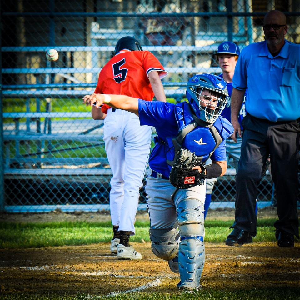Colo-NESCO catcher Kaleb Gray throws a ball down to third base during the Royals' 15-5 loss to Madrid May 25 in Zearing.