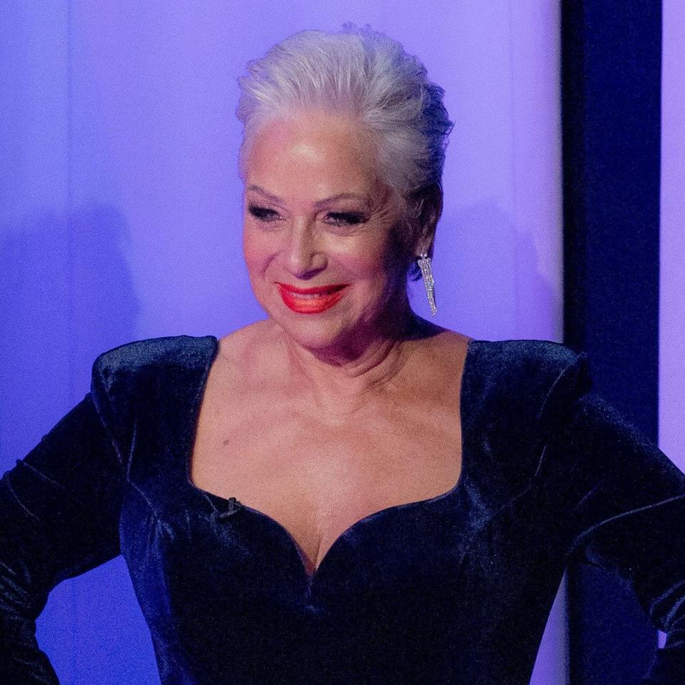 Denise Welch, 65, wows in plunging swimsuit and cowboy boots