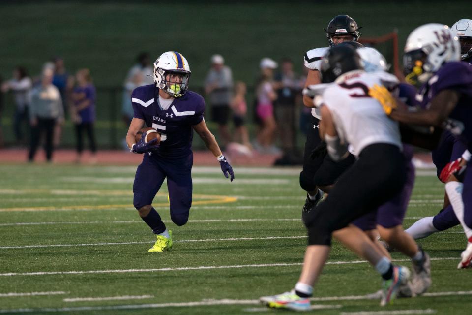 Upper Moreland senior Stephen Broderick carries the ball at Upper Moreland High School on Friday, August 26, 2022. The Bears defeated the Hatters 41-0 in the opening game of the season.