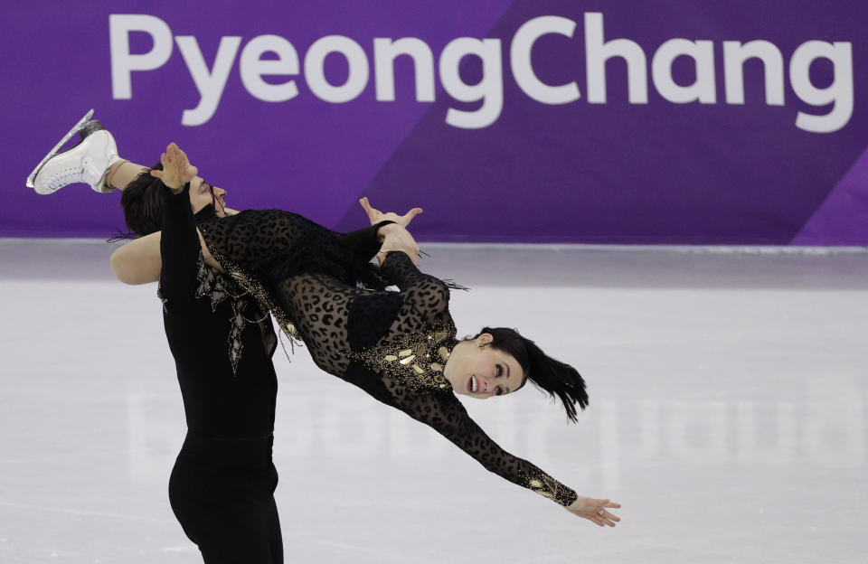 <p>Tessa Virtue and Scott Moir of Canada perform during the ice dance, short dance figure skating in the Gangneung Ice Arena at the 2018 Winter Olympics in Gangneung, South Korea, Monday, Feb. 19, 2018. (AP Photo/David J. Phillip) </p>