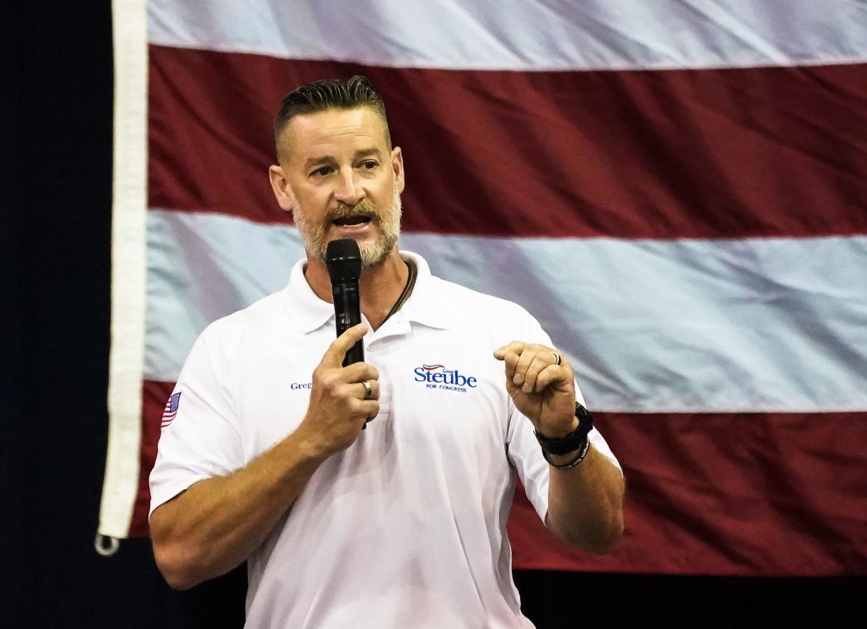 An archival photo of Congressman Greg Steube speaking in Sarasota.