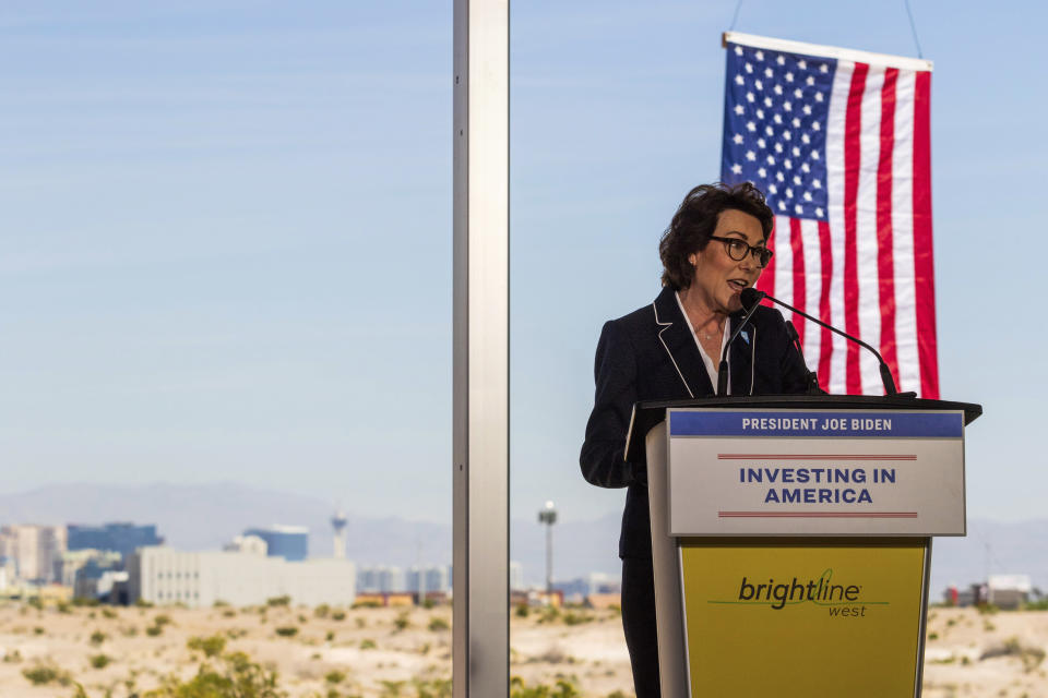 Sen. Jacky Rosen, D-Nev., speaks at the groundbreaking for a high-speed passenger rail on Monday, April 22, 2024, in Las Vegas. A $12 billion high-speed passenger rail line between Las Vegas and the Los Angeles area has started construction. (AP Photo/Ty ONeil)