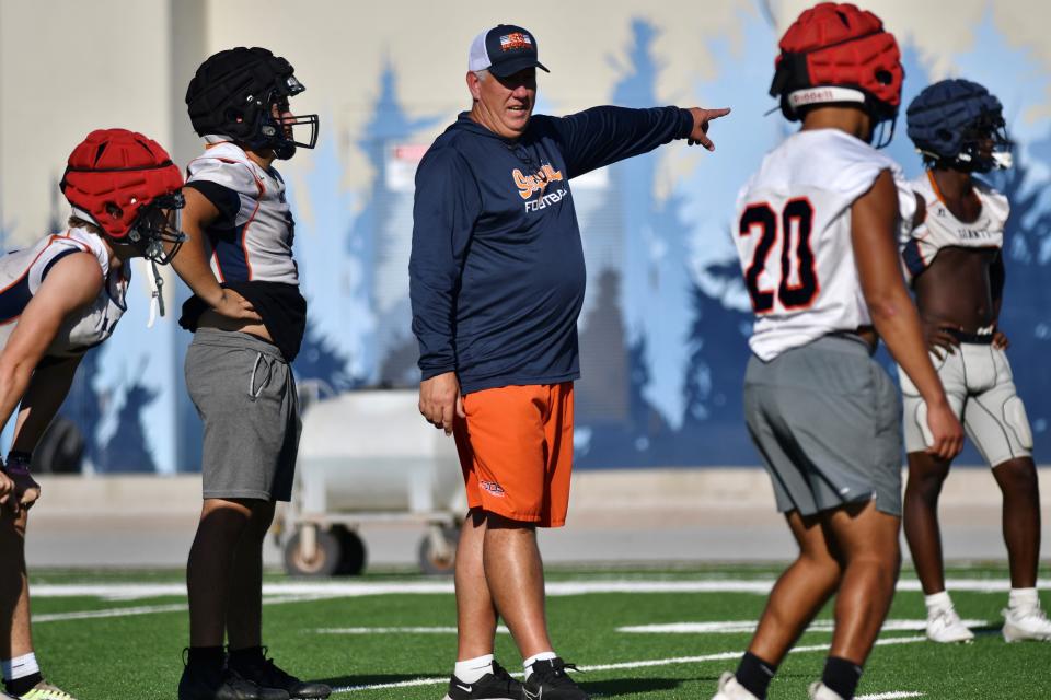 College of the Sequoias assistant football coach Donovan McJunkin directs practice on Aug. 28, 2023 in Visalia.