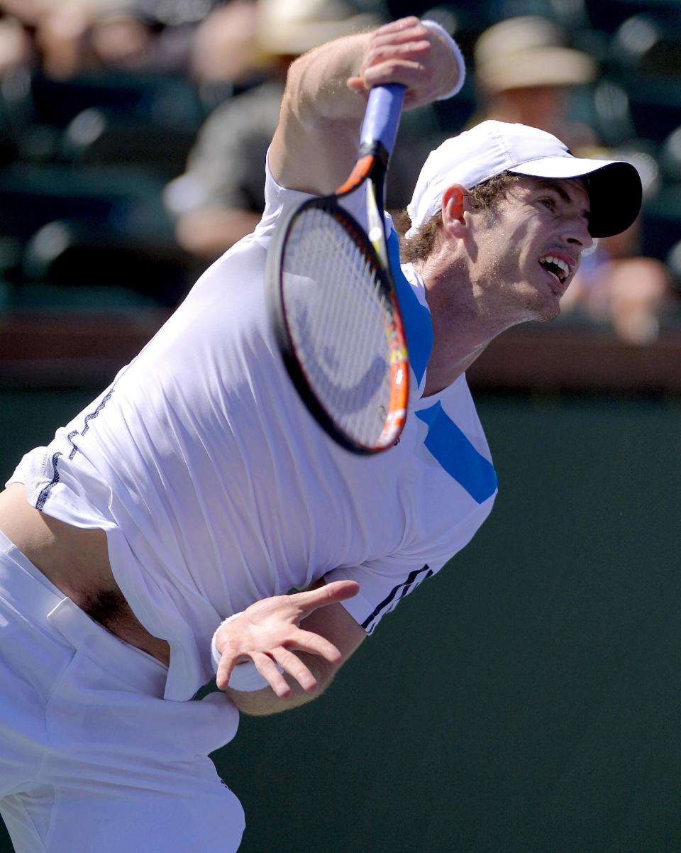 Andy Murray, of Great Britain, serves to Jiri Vesely, of Czech Republic, during a third round match at the BNP Paribas Open tennis tournament, Monday, March 10, 2014, in Indian Wells, Calif. (AP Photo/Mark J. Terrill)