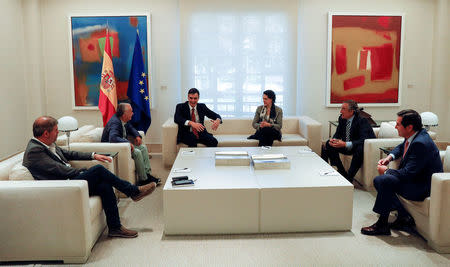 Spain's Prime Minister Pedro Sanchez gestures during a meeting with union leaders and Labour Minister Magdalena Valerio at the Moncloa Palace in Madrid, Spain, June 13, 2018. REUTERS/Paul Hanna