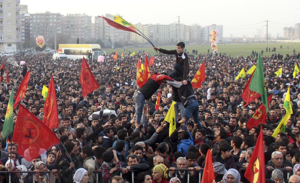 People gather to celebrate in the Kurdish-dominated city of Diyarbakir in southeastern Turkey