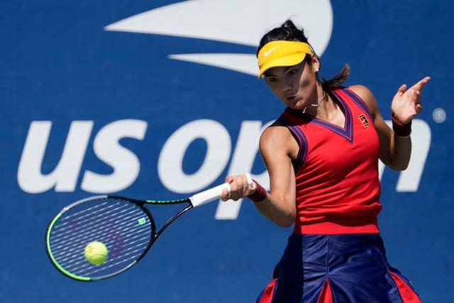 Emma Raducanu hits a forehand during her victory over Zhang Shuai