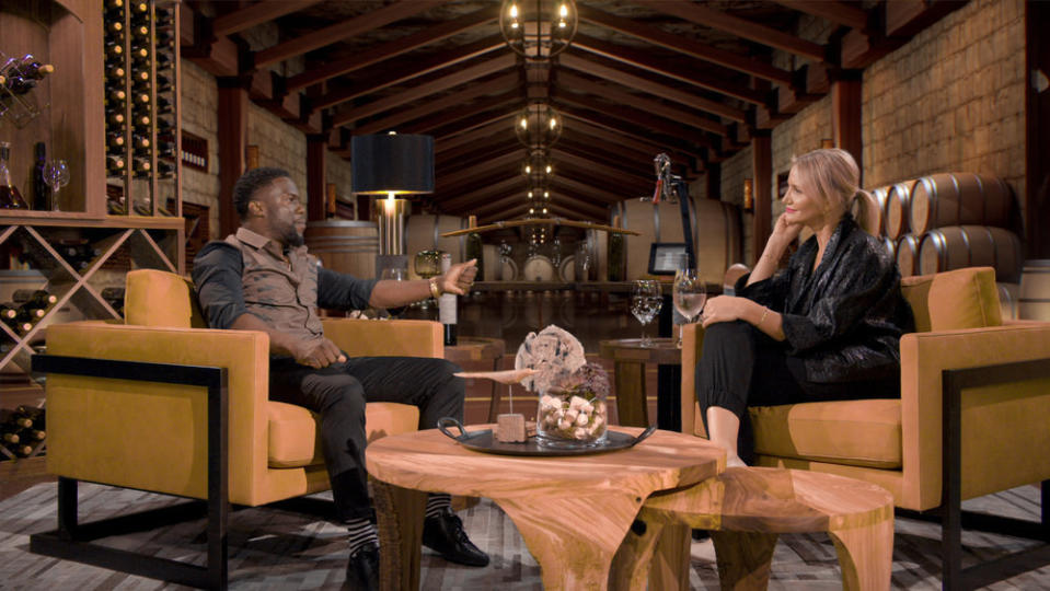 Kevin Hart sits chatting with Cameron Diaz