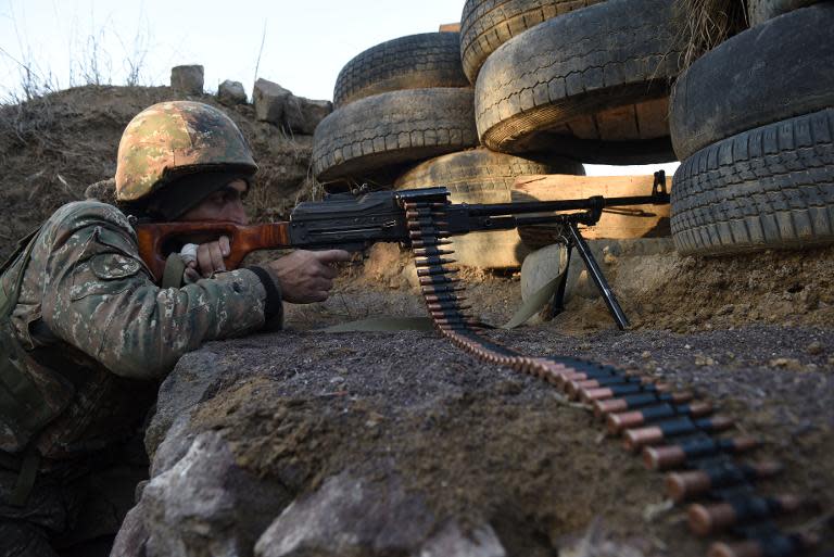 An Armenian serviceman guarding an area near the village of Movses, close to the border with Azerbaijan, on February 16, 2015