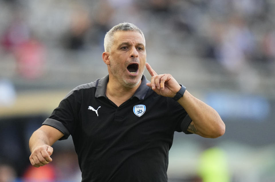 Israel's coach Ofir Haim reacts during a FIFA U-20 World Cup semifinal soccer match against Uruguay at the Diego Maradona stadium in La Plata, Argentina, Thursday, June 8, 2023. (AP Photo/Natacha Pisarenko)