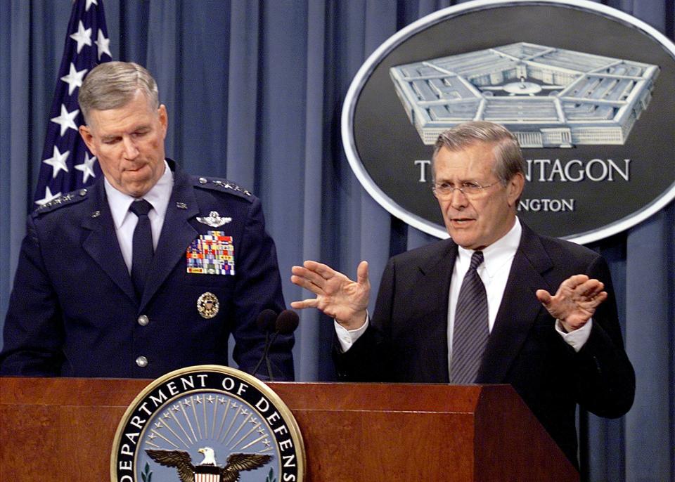 Secretary of Defense Donald Rumsfeld, right, and Gen. Richard B. Myers, chairman of the Joint Chiefs of Staff, hold a news briefing, March 25, 2002, in Washington. (Joe Marquette/AP Photo)