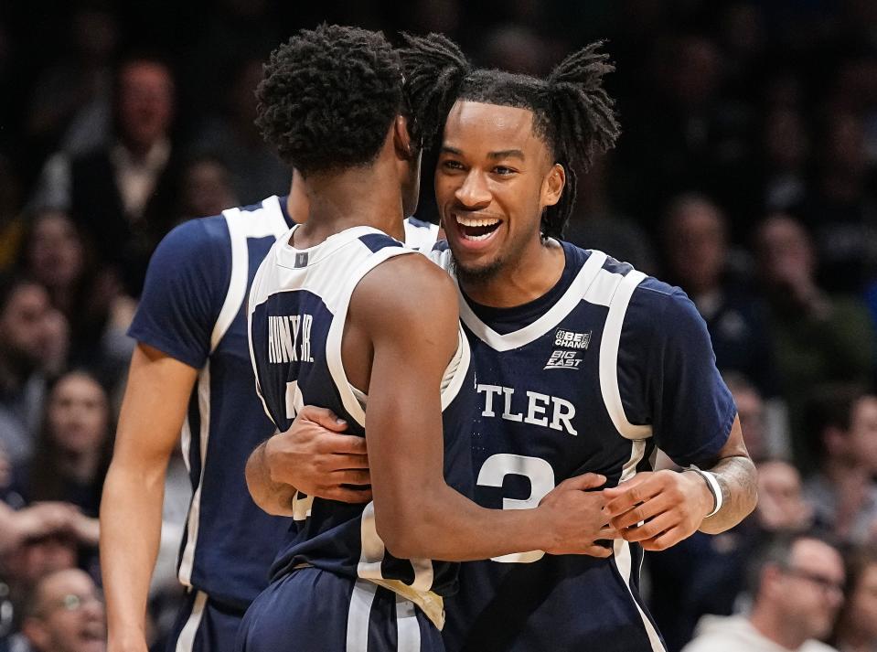Butler Bulldogs guard Jayden Taylor (13) hugs Butler Bulldogs guard Eric Hunter Jr. (2) on Friday, Feb. 10, 2023 at Hinkle Fieldhouse in Indianapolis. The Butler Bulldogs defeated the Xavier Musketeers, 69-67.