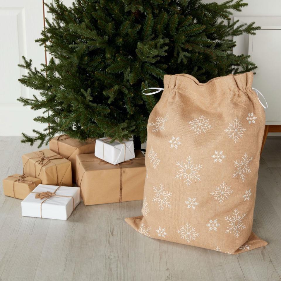 <p>The perfect accessory to fill with presents on Christmas Day, this hessian sack is great for the whole family. There's also a matching <a href="https://www.housebeautiful.com/uk/lifestyle/shopping/g29782705/best-christmas-stockings/" rel="nofollow noopener" target="_blank" data-ylk="slk:stocking;elm:context_link;itc:0;sec:content-canvas" class="link ">stocking</a>, too...</p><p><a class="link " href="https://go.redirectingat.com?id=127X1599956&url=https%3A%2F%2Fwww.diy.com%2Fdepartments%2Fnatural-snowflake-christmas-sack%2F3663602490692_BQ.prd&sref=https%3A%2F%2Fwww.housebeautiful.com%2Fuk%2Flifestyle%2Fshopping%2Fg34447972%2Fbandq-chrismas-range%2F" rel="nofollow noopener" target="_blank" data-ylk="slk:BUY NOW, £10;elm:context_link;itc:0;sec:content-canvas">BUY NOW, £10</a></p>