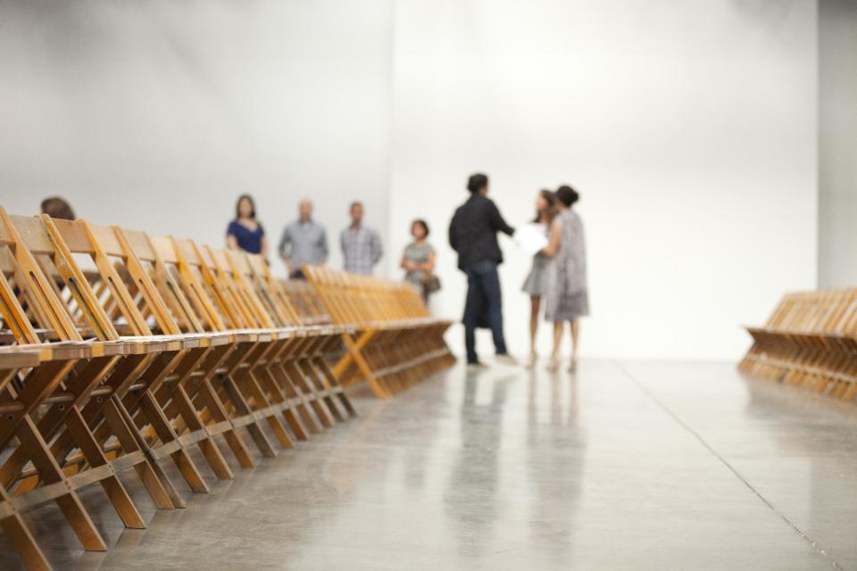 People arrive to watch the Thakoon Spring 2013 collection show during Fashion Week, Sunday, Sept. 9, 2012, in New York. (AP Photo/Karly Domb Sadof)