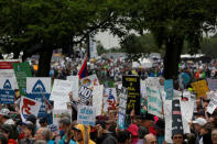 Demonstrators gather at the Washington Monument before marching to the U.S. Capitol during the March for Science in Washington, U.S., April 22, 2017. REUTERS/Aaron P. Bernstein