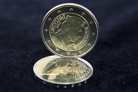 Latvia's euro coins are pictured during a presentation in Riga in this August 26, 2013 file photo. REUTERS/Ints Kalnins/Files