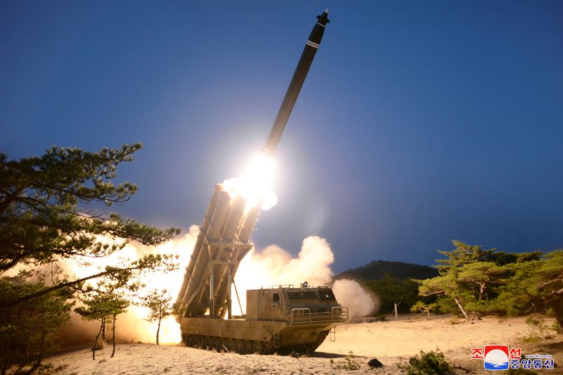 A view shows the testing of what local media call a super-large multiple rocket launcher in North Korea