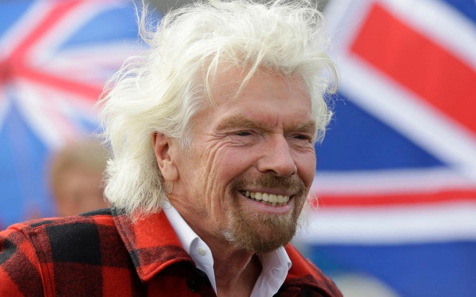 Virgin Atlantic founder Richard Branson is reducing his stake in the airline - AP