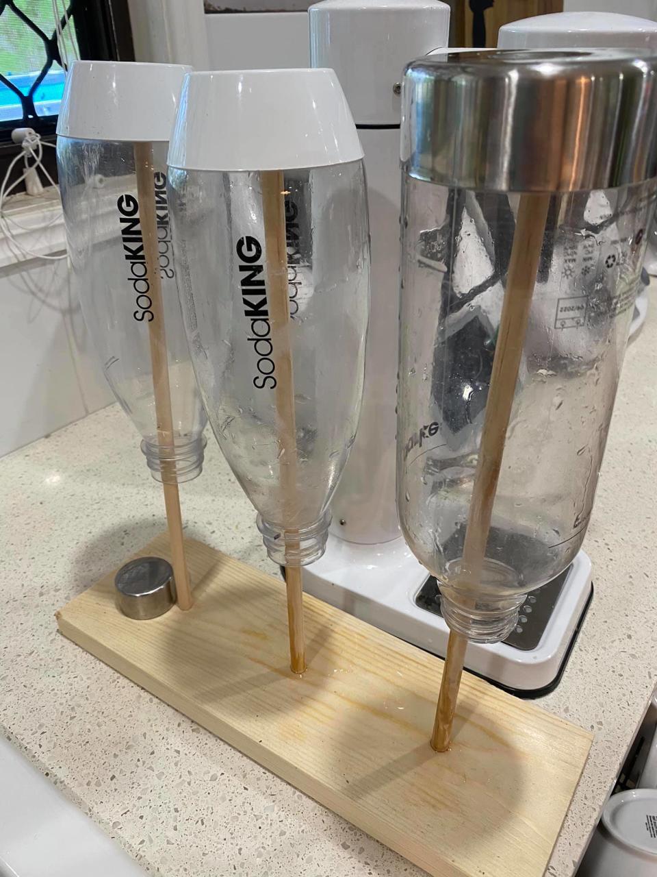 A Kmart shopper has solved the common kitchen dilemma of how to thoroughly dry bottles. Photo: Kmart, Facebook (supplied).