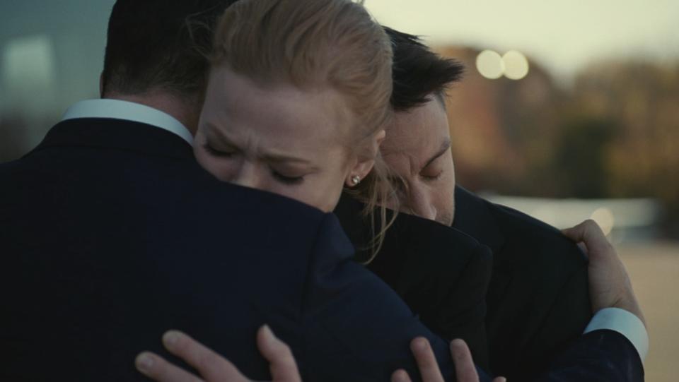 Kendall (Jeremy Strong), Shiv (Sarah Snook) and Roman (Kieran Culkin) embrace when accepting their father’s death.