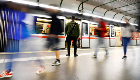 Basel, a 24 year-old migrant from Deraa in Syria, waits for a train in a subway station in Vienna, Austria September 21, 2017. REUTERS/Leonhard Foeger