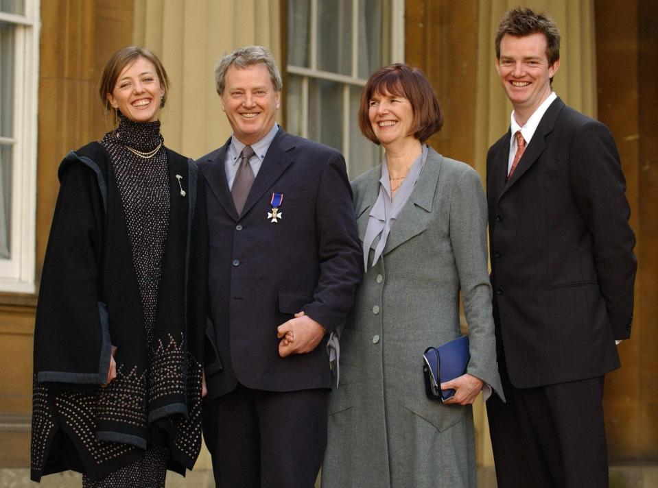 Robert Kime with his wife and children after his appointment as LVO in 2004 - PA