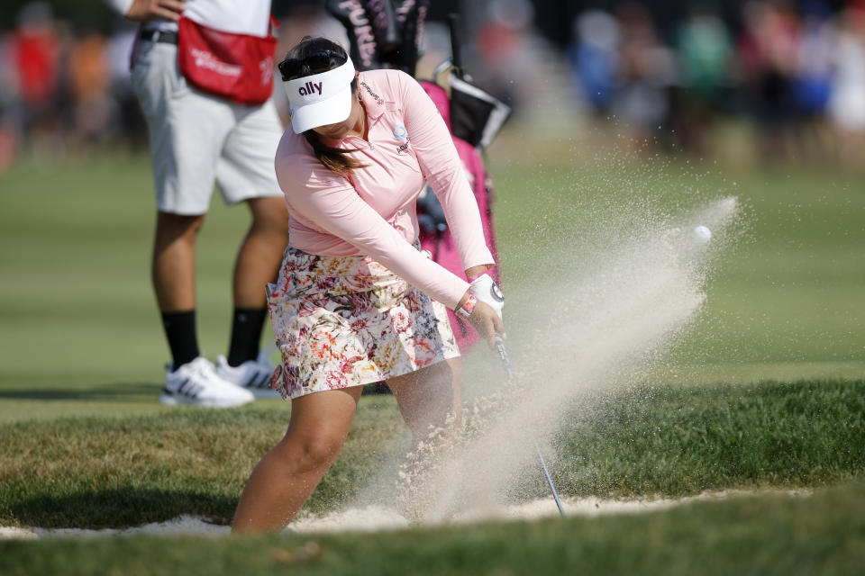 Lilia Vu hits out of the bunker on the fourth hole during a playoff in the final round of the Meijer LPGA Classic golf tournament, Sunday, June 16, 2024, in Belmont, Mich. (AP Photo/Al Goldis)