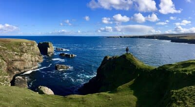 A lone hiker at Belderrig, County Mayo on Ireland's Wild Atlantic Way