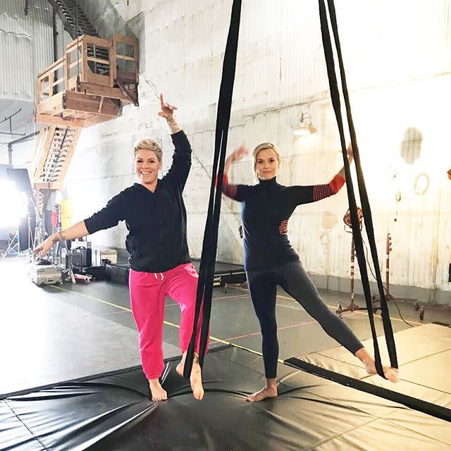 <p>Reese once had Pink teach her how to do aerial acrobatics and, yeah, she admitted she was a little freaked out. "I was completely terrified," she wrote on Instagram. (But hey, she still got her butt there and conquered her fear!)</p><p><a href="https://www.instagram.com/p/Bla4OTSnilT/" rel="nofollow noopener" target="_blank" data-ylk="slk:See the original post on Instagram;elm:context_link;itc:0;sec:content-canvas" class="link ">See the original post on Instagram</a></p>