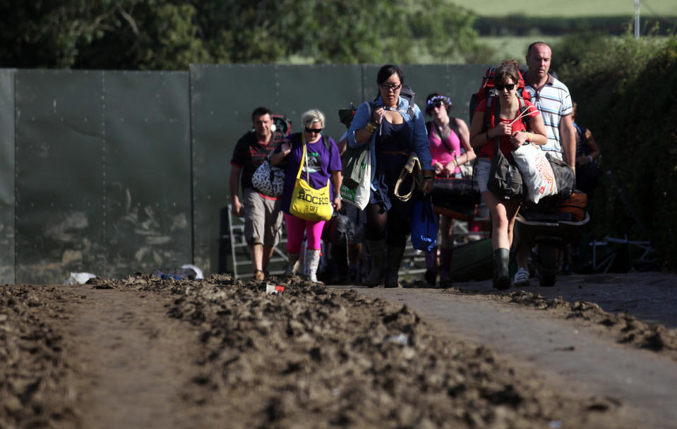 Music Fans Depart From The Glastonbury Festival