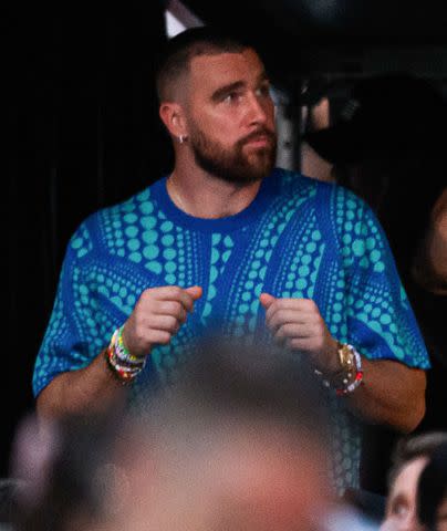 <p>James Gourley/Shutterstock</p> Travis Kelce at Taylor Swift's Eras Tour show at Accor Stadium in Sydney, Australia on 23 Feb 2024