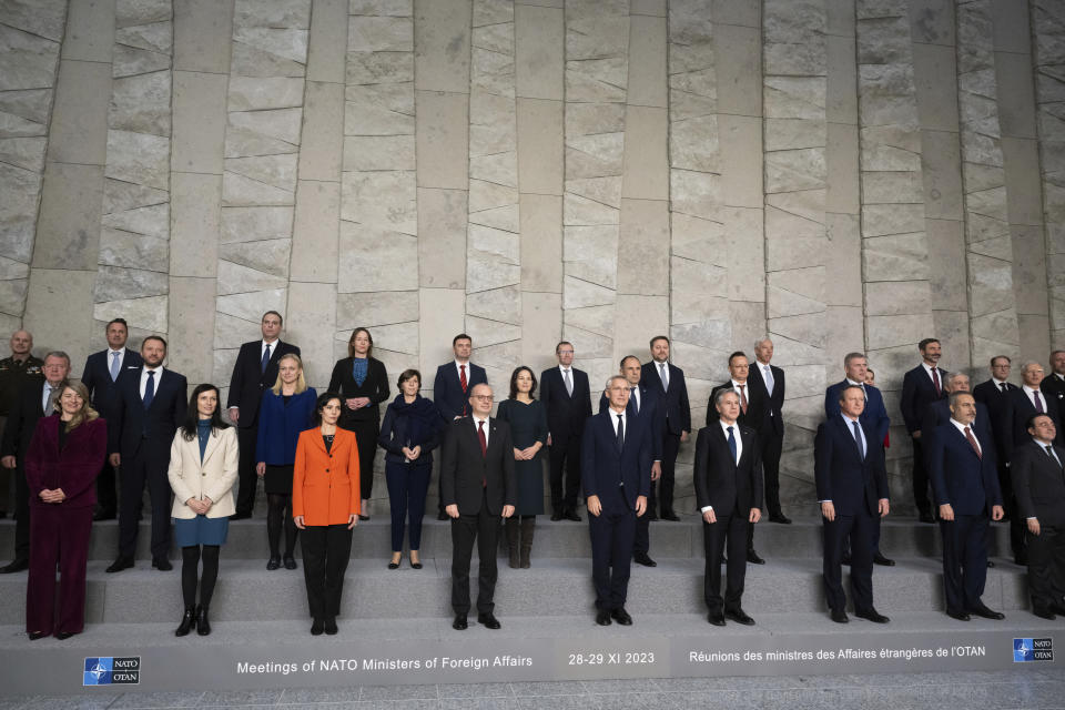 US Secretary of State Antony Blinken, front fourth right, British Foreign Secretary David Cameron, front third right, NATO Secretary General Jens Stoltenberg, front fifth right, and other foerign ministers line up for a family photo during the NATO Foreign Ministers meeting at the NATO Headquarters in Brussels, Belgium, Tuesday, Nov. 28, 2023. (Saul Loeb/Pool Photo via AP)