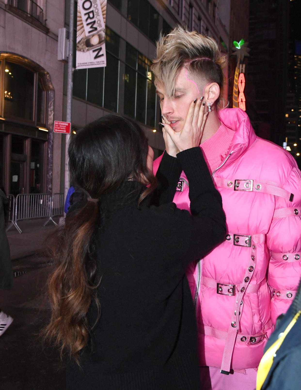 NEW YORK, NEW YORK - DECEMBER 31:  Megan Fox and Machine Gun Kelly in Times Square during 2021 New Year’s Eve celebrations on December 31, 2020 in New York City. (Photo by Kevin Mazur/Getty Images)