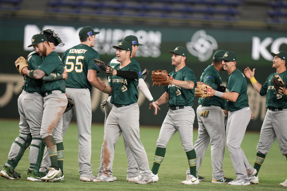 Australia's players celebrate after their win over the Czech Republic in their Pool B game at the World Baseball Classic at the Tokyo Dome Monday, March 13, 2023, in Tokyo. (AP Photo/Shuji Kajiyama)