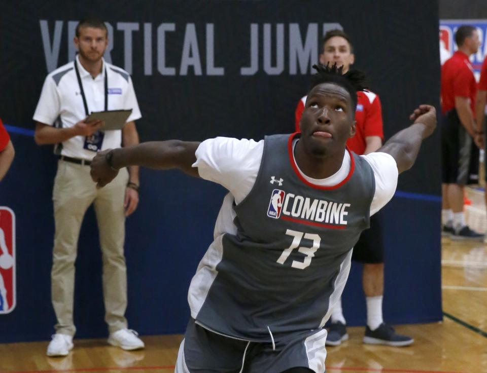 Former Wisconsin forward Nigel Hayes participates in the running vertical jump at the 2017 NBA draft combine in Chicago. (AP)