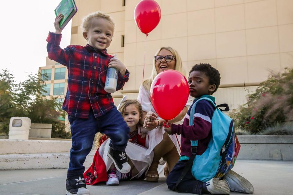 Alison Canetty, 50, adopted Pierce Canetti, 2, front left, on Saturday.