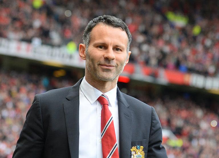 Manchester United's caretaker manager Ryan Giggs is pictured before the start of an English Premier League football match at Old Trafford in Manchester, northwest England, on April 26, 2014