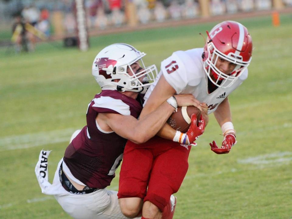 Hawley's Will Scott tackles Jim Ned's Jake Rushing on Friday.