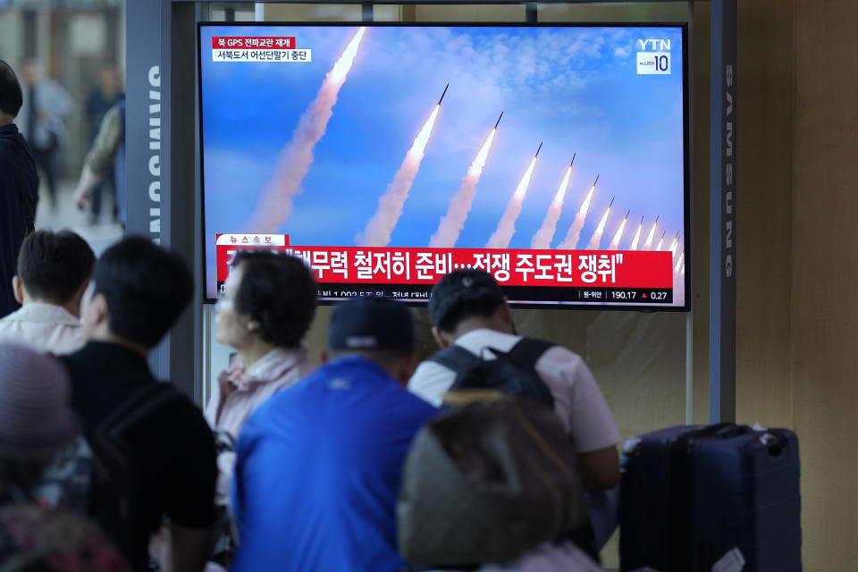 A TV screen shows a report of North Korea's multiple rocket launchers during a news program at the Seoul Railway Station in Seoul, South Korea, Friday, May 31, 2024. North Korean leader Kim Jong Un supervised firing drills involving nuclear-capable "super-large" multiple rocket launchers to show the country's ability to carry out preemptive attacks on rival South Korea, state media reported Friday. (AP Photo/Lee Jin-man)