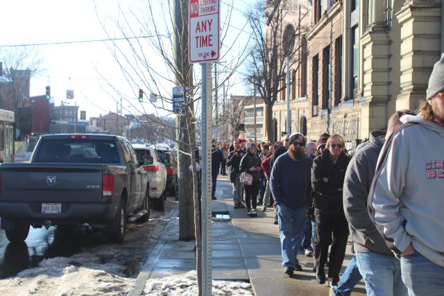 Fans of both the Bengals and beer wait in long lines for