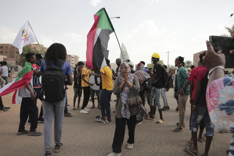 Sudanese demonstrators attend rally to demand the return to civilian rule, in Khartoum, Sudan, Thursday, Oct. 6, 2022. Sudan has been mired in political turmoil since its military seized power in a coup last October after three decades of repressive Islamist rule under former President Omar Al Bashir. (AP Photo/Marwan Ali)