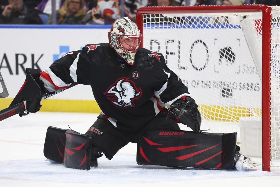 Buffalo Sabres goaltender Ukko-Pekka Luukkonen (1) slides across the crease to make a save during the second period of an NHL hockey game against the Colorado Avalanche, Sunday, Oct. 29, 2023, in Buffalo, N.Y. (AP Photo/Jeffrey T. Barnes)