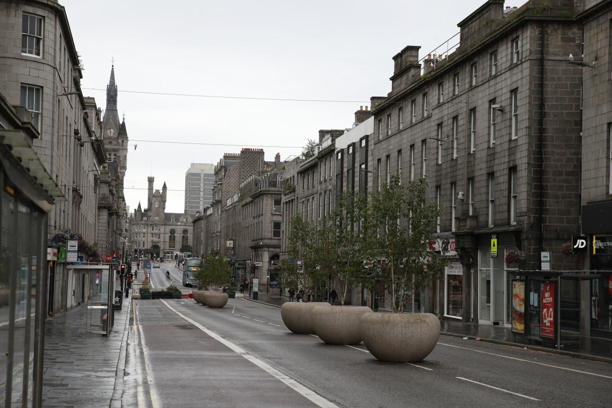 A deserted Union Street in Aberdeen after bars, cafes and restaurants were ordered to close in August (PA)