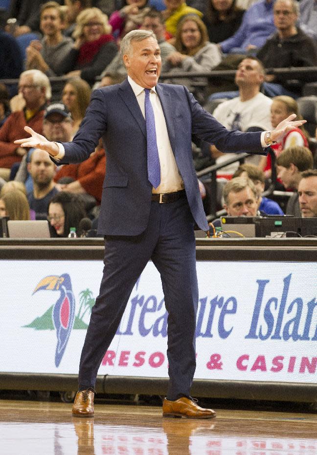 Houston Rockets head coach Mike D'Antoni reacts during the first half of an NBA basketball game against the Minnesota Timberwolves, Saturday, Dec. 17, 2016, in Minneapolis. Houston won 111-109 in overtime. (AP Photo/Paul Battaglia)