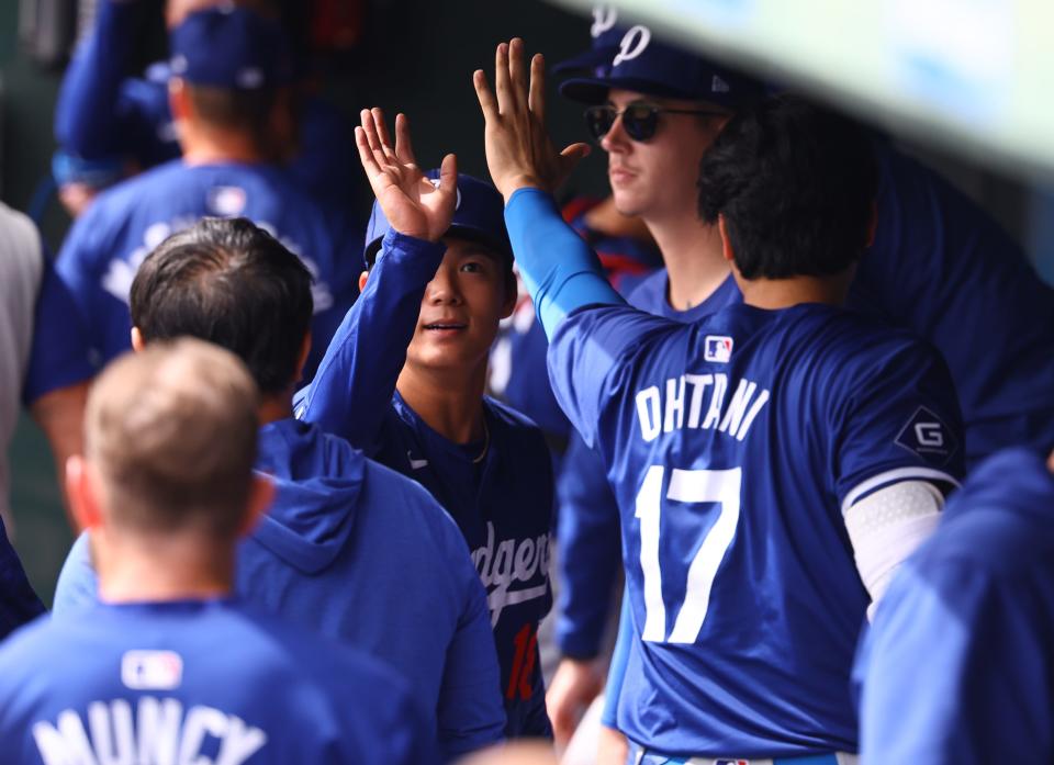 Yoshinobu Yamamoto (center) and Shohei Ohtani are at the center of the Dodgers' plans for the next decade.