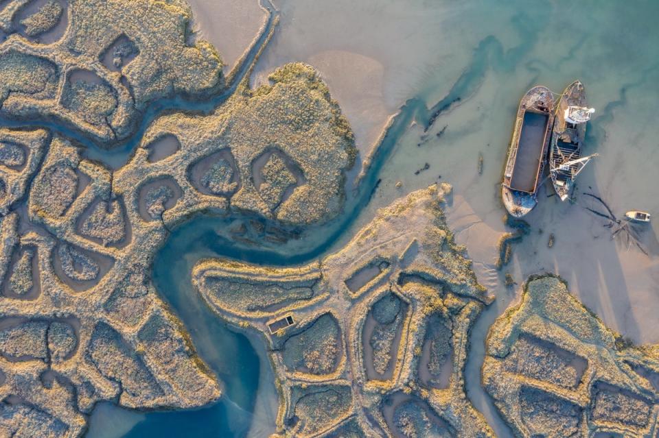 ‘The Old Oyster Beds’ taken in Brightlingsea, Essex, by Justin Minns is the overall winner in the 2022 Ultimate Sea View photography competition run by national maritime charity, the Shipwrecked Mariners’ Society (Justin Minns/Shipwrecked Mariners’ Society) (PA Media)